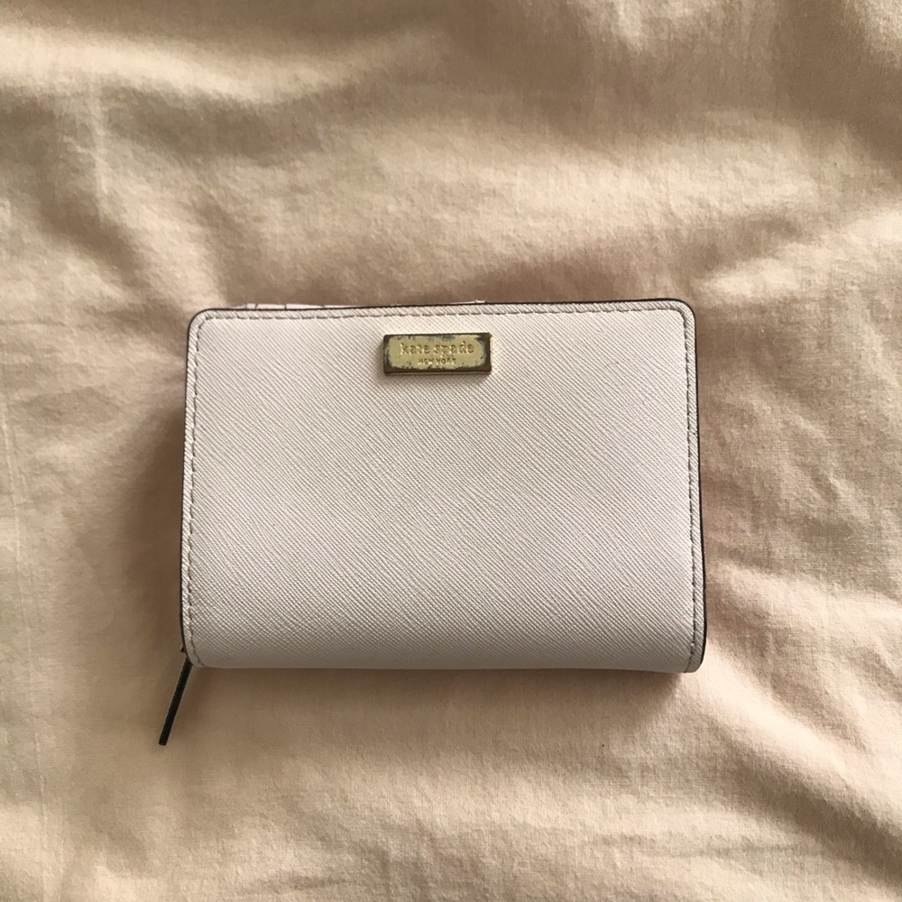 kate spade newbury lane wallet baby pink